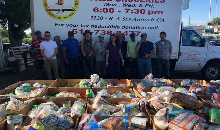 Volunteers in our food giveaway